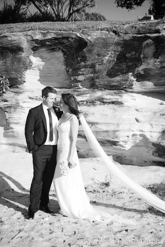 Bride and groom alongside the island at Balmoral - wedding photography sydney